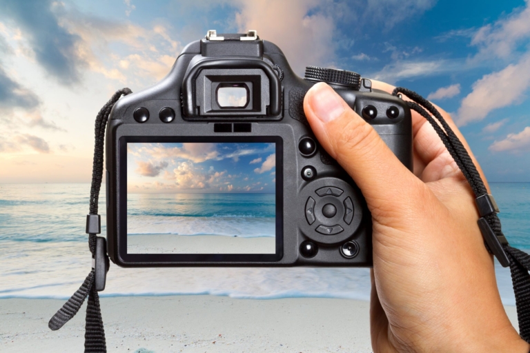 Photographer taking picture of beach