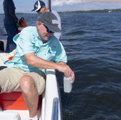 Dr Tomasko Collecting Water Samples