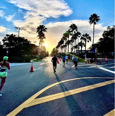 runners at sunset