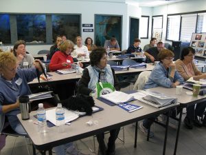 People sitting in classroom for teacher training